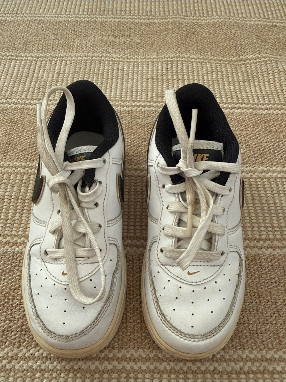 Nike Kids White Sneakers with Black Lining and Brown Accents